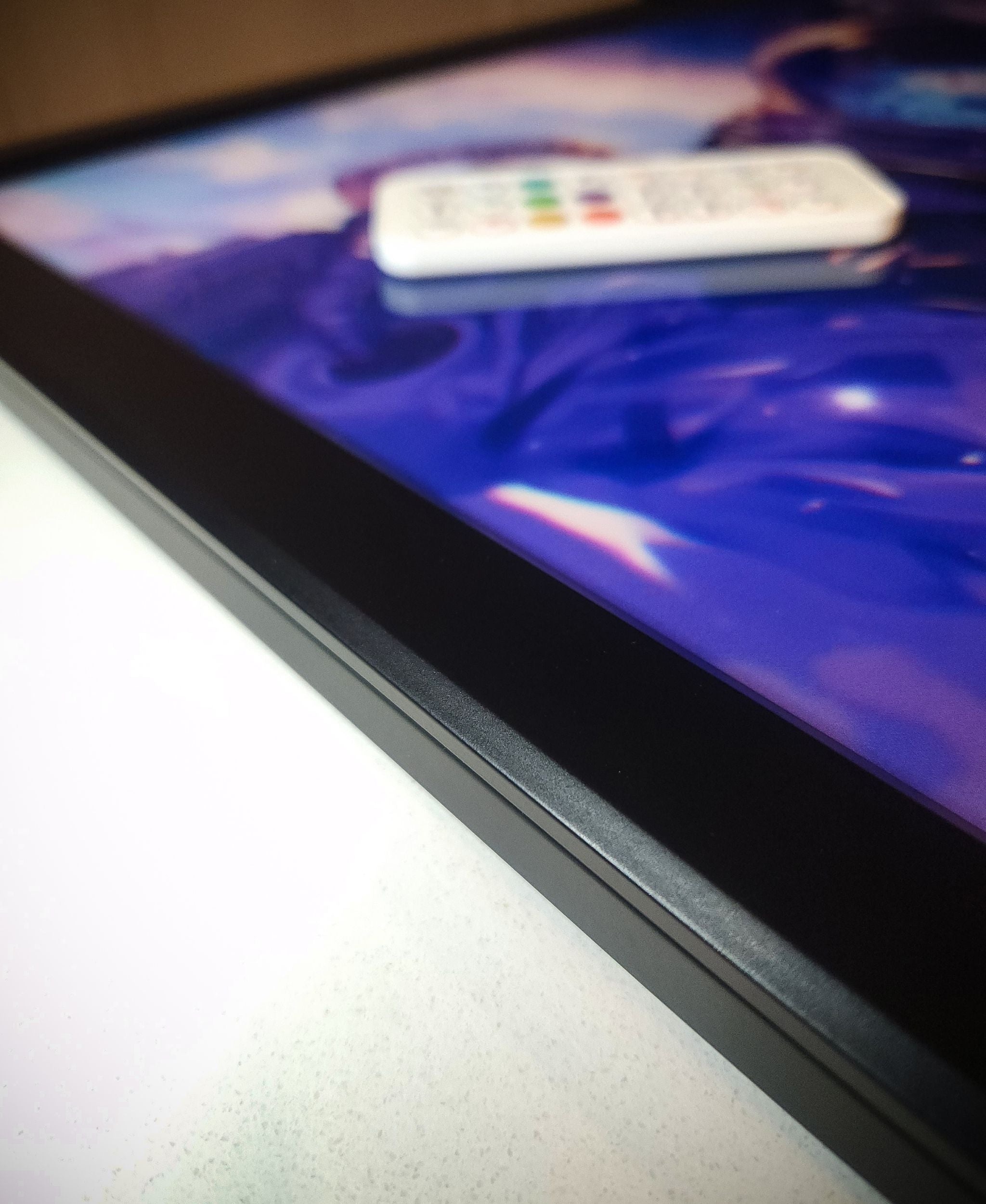 RGB backlit frame "CHROMAFRAME" to add backlighting to acrylic posters by Arcadia North. Ambient lighting for gaming setup.