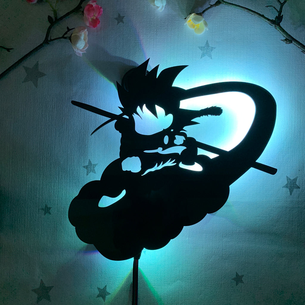 Dragon Ball Kid Goku on Flying Nimbus anime silhouette light
