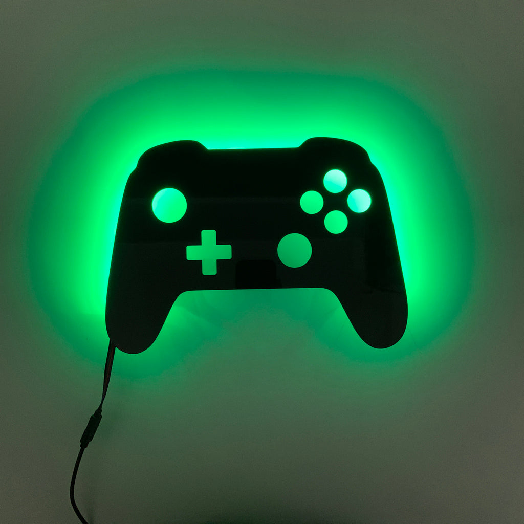 Gaming controller silhouette light